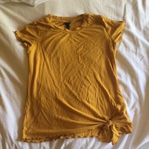 Shirt from art class with tie at bottom